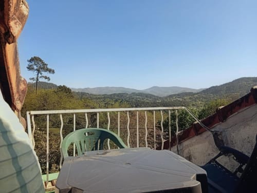 Panoramic mountain view from Domaine de Cabrières balcony in St Jean Du Gard, France