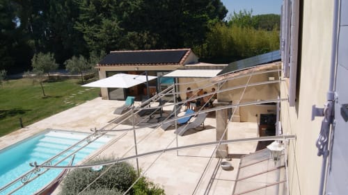 Villa La Bastide de Luson avec piscine chauffée, terrasses, salons d'extérieur et vues sur la campagne à Maussane-les-Alpilles