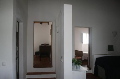 Interior hallway of 2-bedroom apartment at Monte Da Morena with mirrored doors and wooden floors, Serpa Portugal