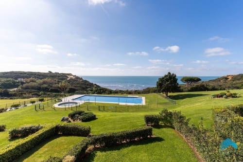 Apartamento Barrosa con piscina con vistas al mar Mediterráneo y paisaje costero