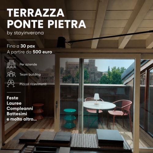 Terrazza Ponte Pietra rooftop terrace in Verona with medieval towers view, modern furniture, and event space