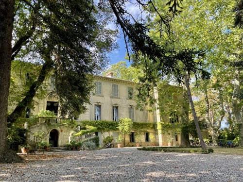 Domaine de Montlaur countryside villa nestled among green trees in Val-de-Dagne, France