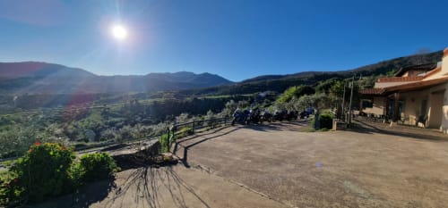 Hotel Atalaya terrace overlooking green valleys and mountains in Guadalupe, Cáceres, Spain