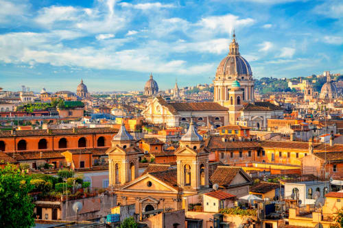 Skyline storico di Roma con chiese cupole e edifici in terracotta, vista dalla Terrazza di Santa Maria Maggiore