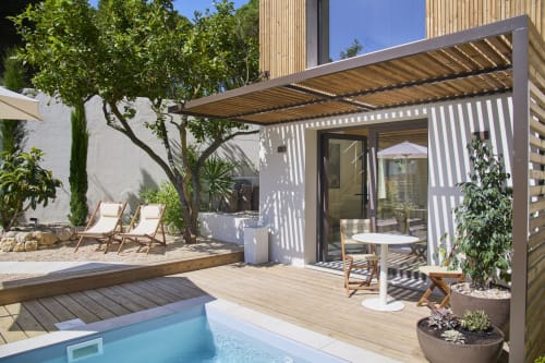 Private pool and wooden deck with pergola at Casa Redonda duplex in Aroeira, Portugal