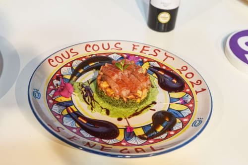 Piatto del Couscous Fest 2021 a Mappamondi Venezia con melanzane e salsa verde