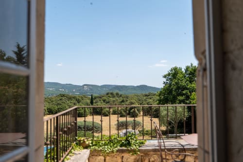 View from Mas Bella Cortis balcony overlooking Provençal countryside in La Garde-Adhémar, France