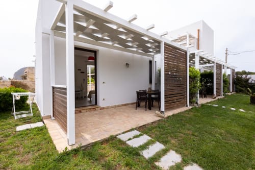 Modern beachfront apartment at Senia del Rais, Favignana with terrace, pergola, and ocean views