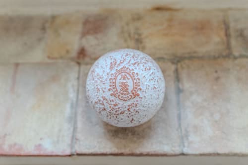 Decorative soap ball with vintage crest at Mas Bella Cortis bed and breakfast in La Garde-Adhémar, France