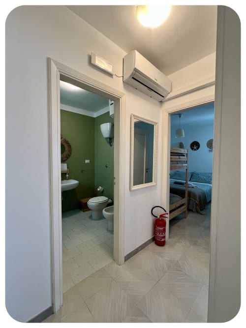 Villa Adua hallway with bathroom access and bedroom view, Dimore Adua in Ostuni