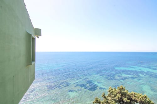 Balcony view of crystal-clear Mediterranean Sea from Xanadú apartment at Riurau Home, Calpe
