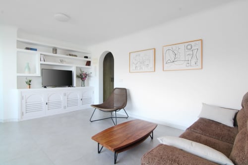 Modern living room in Xanadú apartment at Riurau Home, Calpe with wooden furniture and sea view