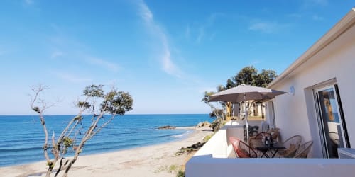 Appartement en front de mer à la Résidence Marina di Bravone en Corse avec vue sur mer, terrasse et accès direct à la plage