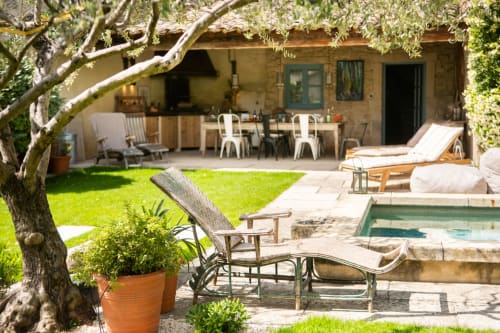 Le Jardin Secret cottage pool view with lounge seating, lawn, and terrace in Grignan