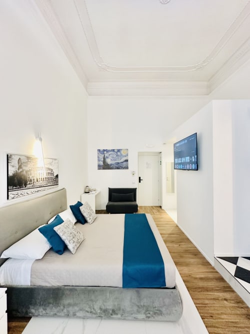 Raffinata Suite Quadrupla Moderna presso St Mary Major Loft a Roma con letto queen, TV a schermo piatto e vista sulla città