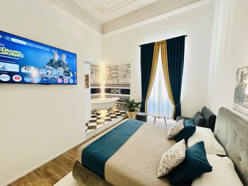 Deluxe Quadruple Room St Mary Major Loft Roma con vista città, TV schermo piatto e arredamento moderno