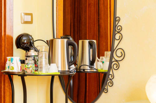 Hotel welcome tray with electric kettles and refreshments at Agriturismo Chiai Francesco in Bari Sardo