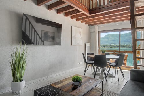 Emmlea apartment Le Lac Suspendu with lake view, TV, dining area, and balcony overlooking Tresserve lake