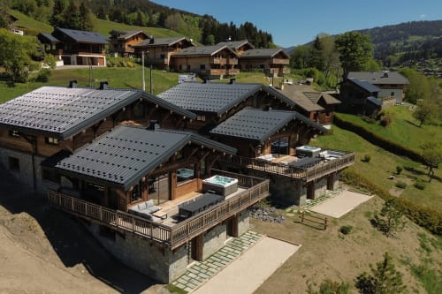 Chalet Magy 3 with solar panels and hot tub overlooking French Alps near Les Gets
