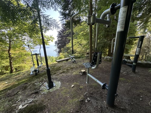 Outdoor fitness equipment on shaded terrace overlooking Lake Maggiore, Stresa luxury spa retreat
