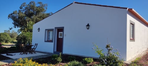 Blue and white apartment at Monte da Morena Agro Turismo, Serpa, with garden view, furnished terrace, and landscaped grounds