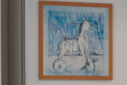 Sketch-style artwork of a horse with saddle and reins in blue tones, framed in wood, displayed in Pescara INN Beach House