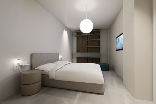 Suite Junior con balcone di Holiday Suites: camera moderna con letto imbottito grigio, lampada a sospensione e arredamento minimalista in Italia