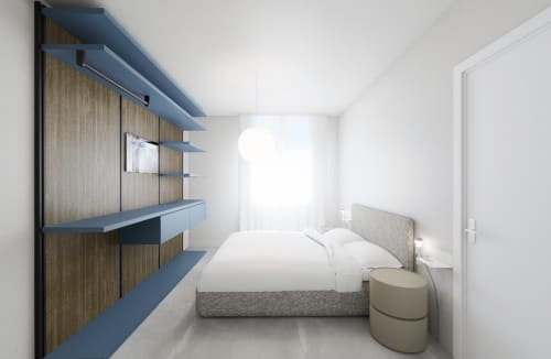 Camera Modern City Suite presso Holiday Suites con letto, scaffalature blu e design minimalista