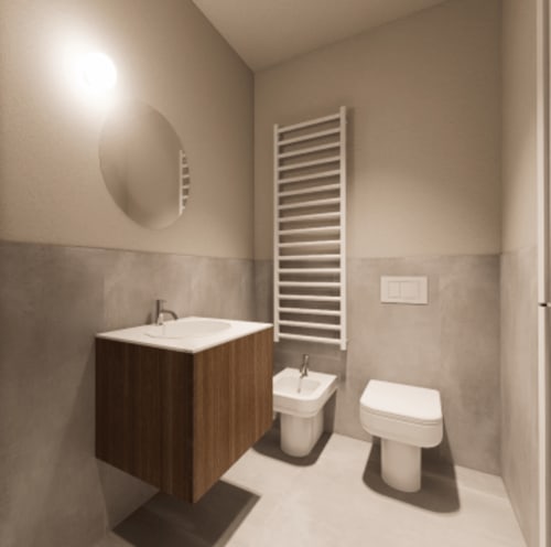 Bagno moderno nella suite Holiday Suites City con vanity in legno, bidet, WC, scaldasalviette e specchio rotondo