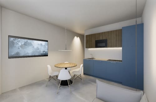 Suite Moderna in Città presso Holiday Suites con zona pranzo con tavolo rotondo, cucina blu, TV a parete e design contemporaneo