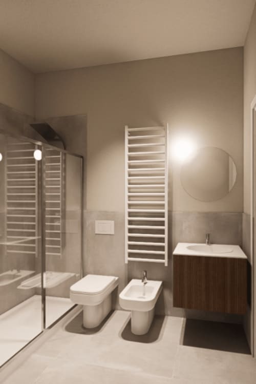 Bagno moderno della Balcony Suite con scaldasalviette, doppio lavabo e doccia walk-in