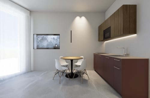 Suite moderna di 2 camere in Italia con angolo cottura, zona pranzo e arredi contemporanei