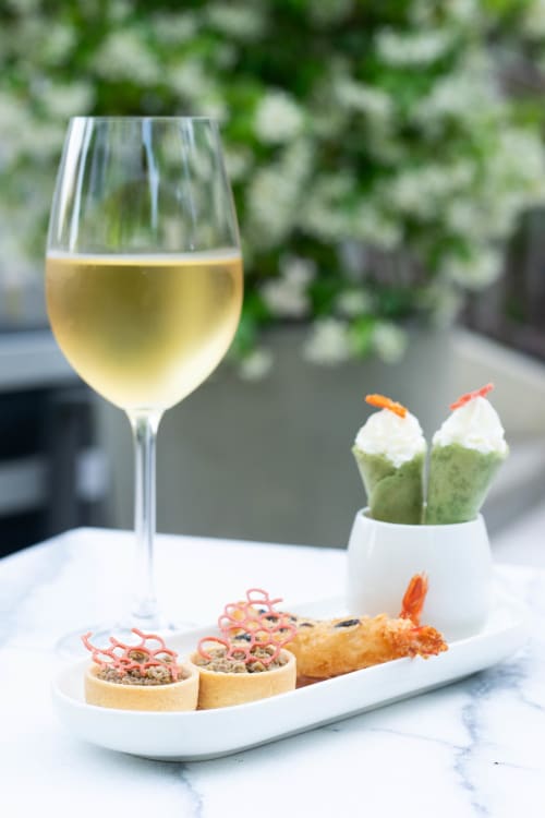 White wine and gourmet appetizers at Pavillon Des Millesimes, Lussac