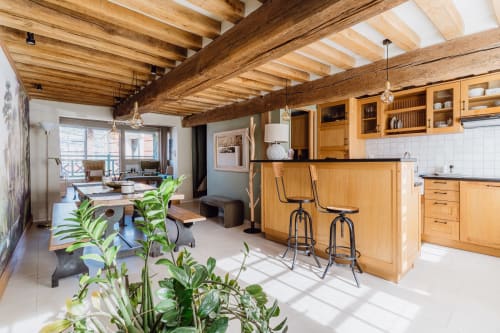 Spacious open-plan kitchen and living area with wooden beams at Les Maisons de Pierre et Valérie, Honfleur