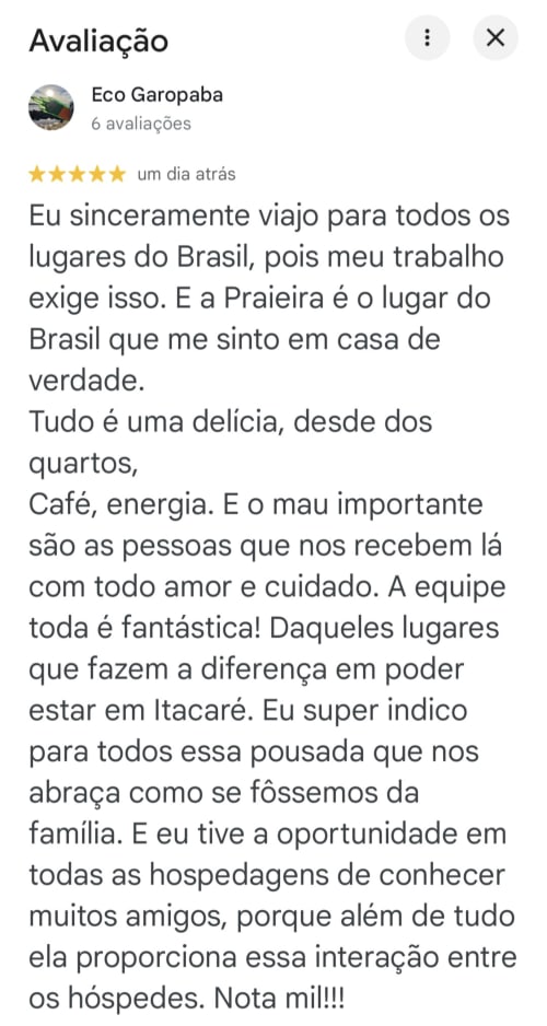 Five-star review for Praieira Pousada hostel in Itacaré, praising accommodations, coffee, and welcoming staff