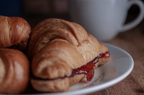 Croissants with jam at Hôtel l'Orangeraie Lavandou, Le Lavandou, served on white plate