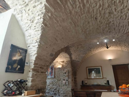 Historic stone archway with exposed brick ceiling in Magnanerie de Sainte Croix B&B, Saint Hippolyte de Caton