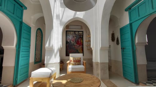 Riad Dar Kleta apartment in Marrakech with turquoise doors, arched ceiling, and traditional Moroccan decor