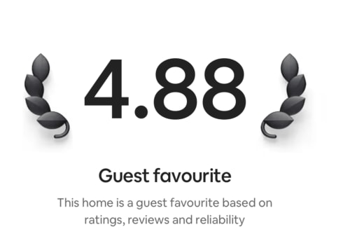 4.88 guest favourite rating badge for Georgian Townhouse Topsham villa with laurel wreath icons