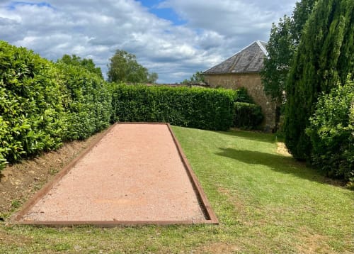 Terrain de pétanque dans le jardin du Gîte La Vieille Ferme de La Doynie, Saint-Geniès