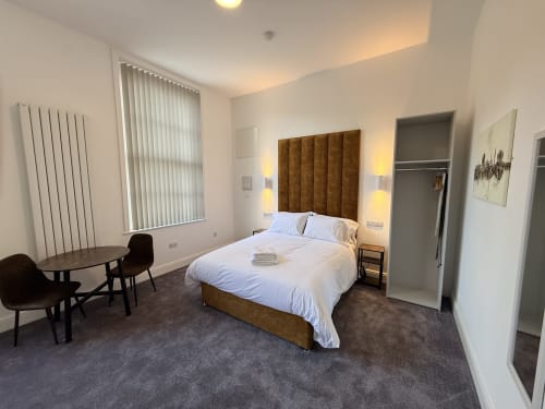 Deluxe Studio at Fishergate Residences Preston with king size bed, desk area, and modern amenities