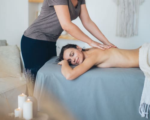 Woman receiving relaxing back massage at Maison Monsieur Léger spa in Montaut, France