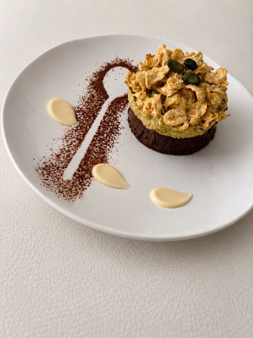 Gourmet chocolate dessert with caramel crust and cocoa powder plating at La Parenthèse de Villepey, Saint Aygulf