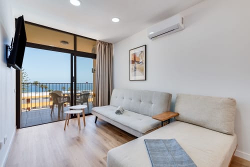 Cactus Dunes seaview apartment in Gran Canaria with modern seating, sea view balcony, and ocean vista