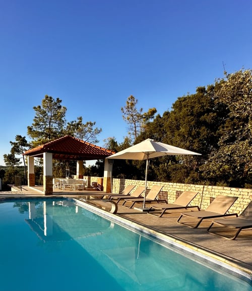 Quinta Boa Vida pool with loungers, pavilion and stone wall in Alcobaça, Portugal