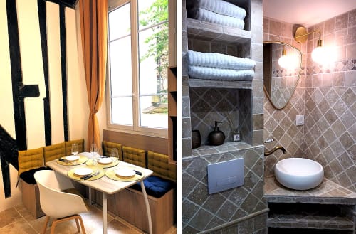 Coin repas et salle de bain moderne de l'appartement ATHEA Paris, murs carrelés et équipements complets