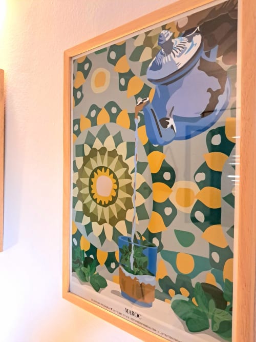 Colorful Moroccan artwork with geometric patterns and figure in blue at Vent Des Dunes, Essaouira hotel