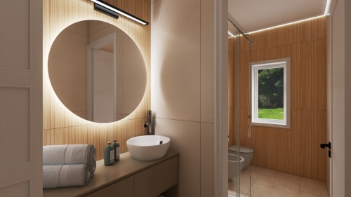 Modern bathroom at Stella CasaBono hotel in Sulmona with circular illuminated mirror, round sink, and wood-paneled walls