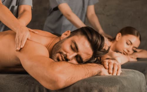 Man receiving professional massage therapy at Clos Céleste wellness spa in Normandy, France
