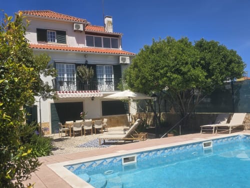 Sesimbra villa with swimming pool, garden, and terrace overlooking Mediterranean coast